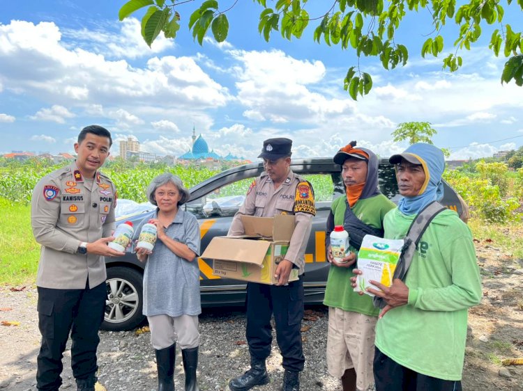 Polsek Taman Salurkan Bibit dan Pupuk untuk Dukung Lahan Jagung